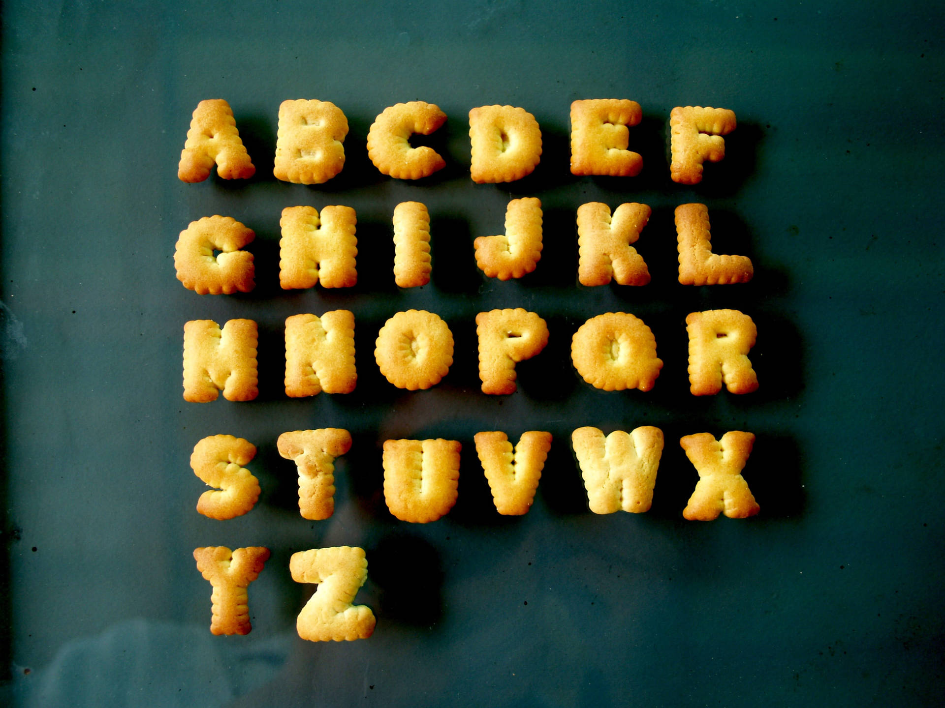 Abc Letters Made Out Of Crackers Wallpaper
