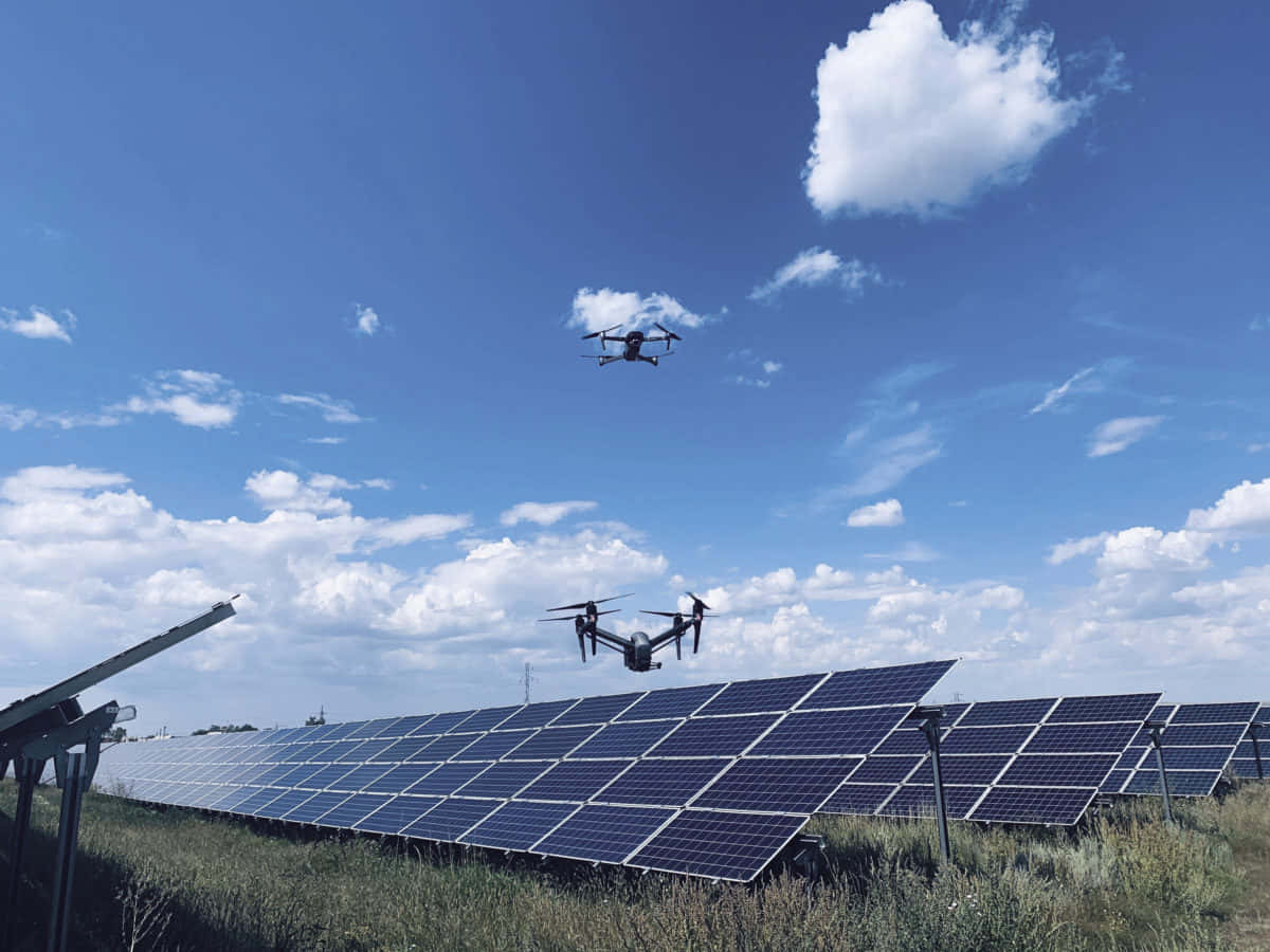 Above Automated Drones Powered By Solar Panels Wallpaper