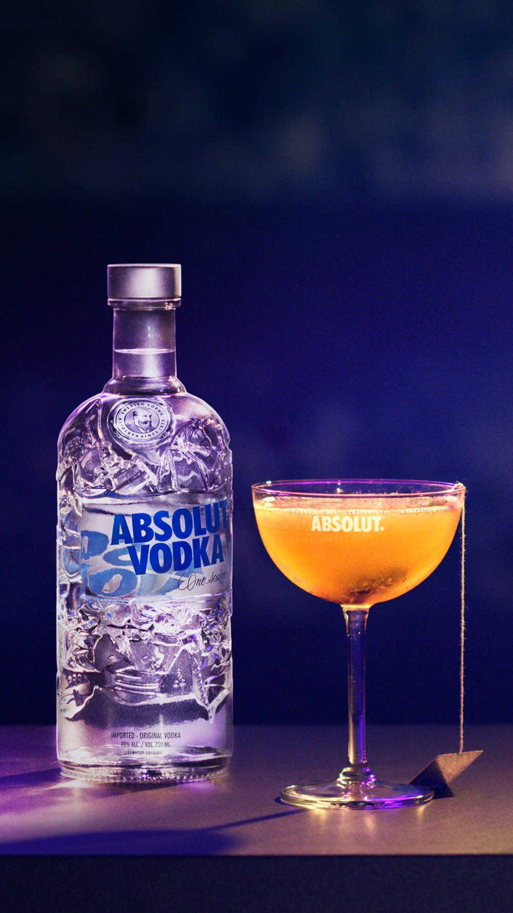 Absolut Vodka Bottle And Glass With Orange Cocktail Wallpaper