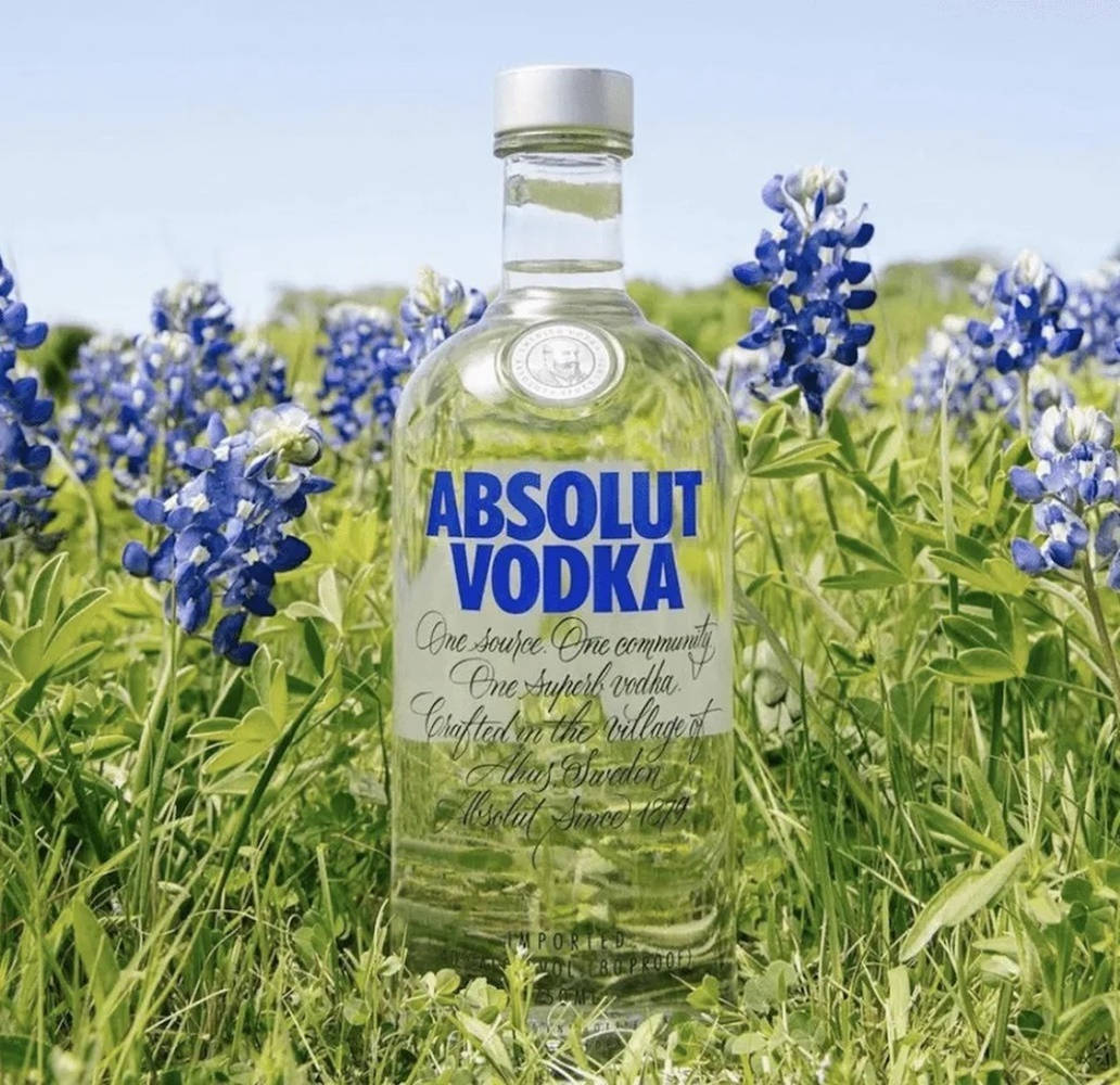 Absolut Vodka With Bluebonnet Flowers Wallpaper