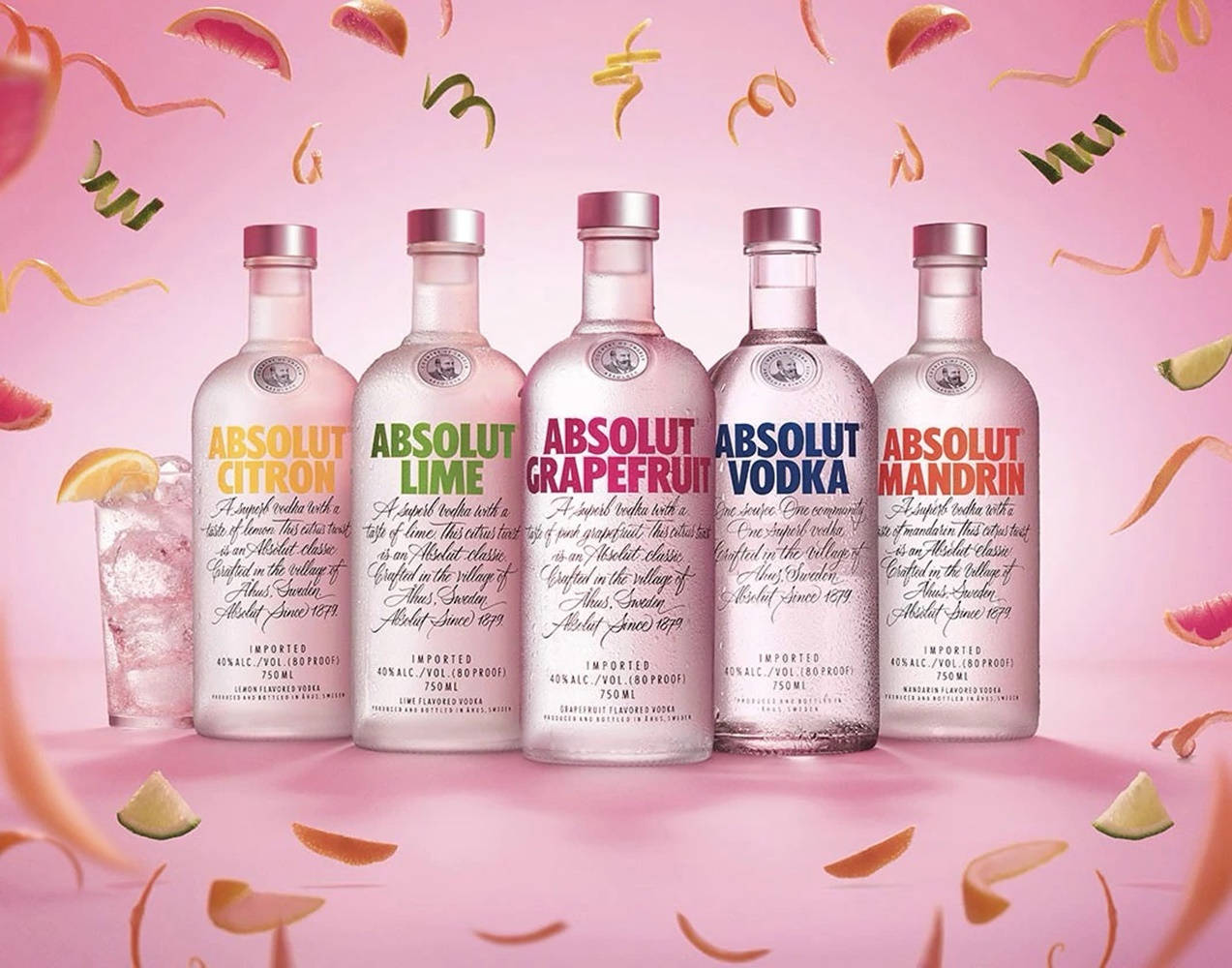 Absolute Vodka Different Flavors With Fruit Confetti Wallpaper