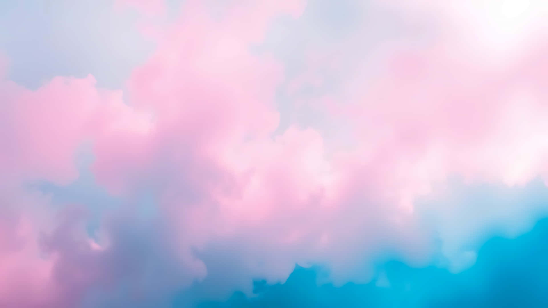 Abstract Pink And Blue Clouds Creating A Dreamy Pastel Background Wallpaper