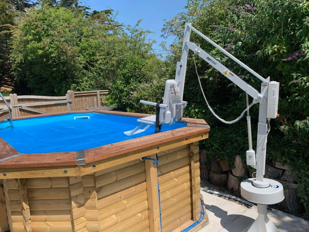 Accessible Hot Tub With Lift Device Wallpaper
