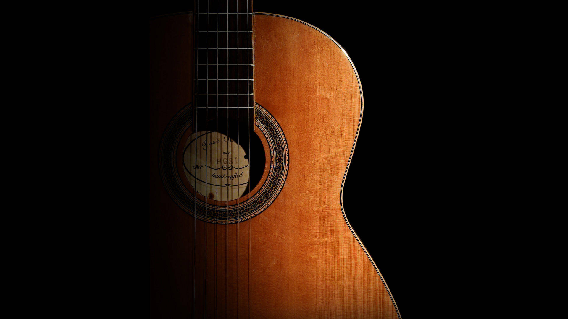 Acoustic Guitar Partially Lit Wallpaper