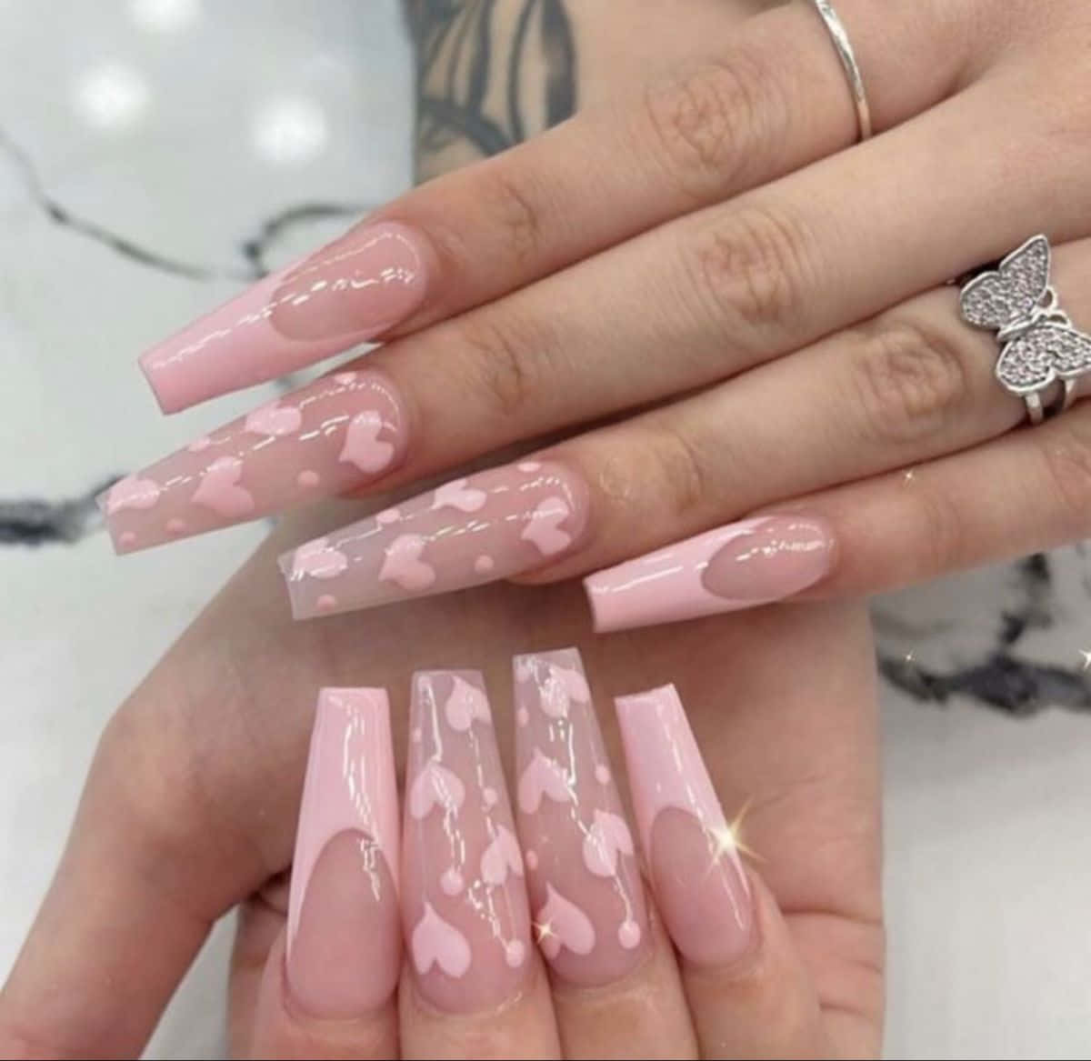 Pink Acrylic Nails With Hearts On Them Wallpaper