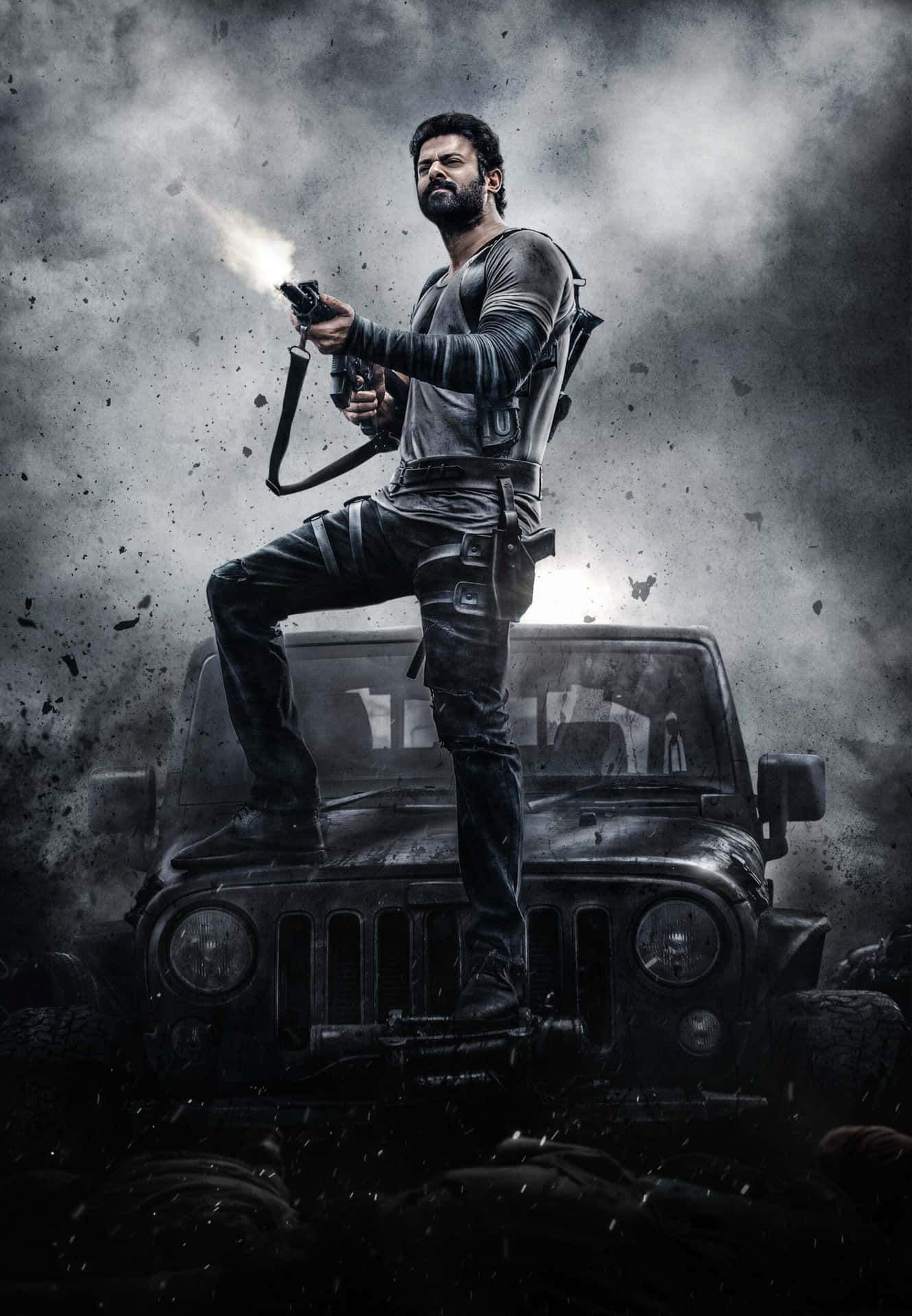 Action Hero Standing On Jeep With Gun.jpg Wallpaper