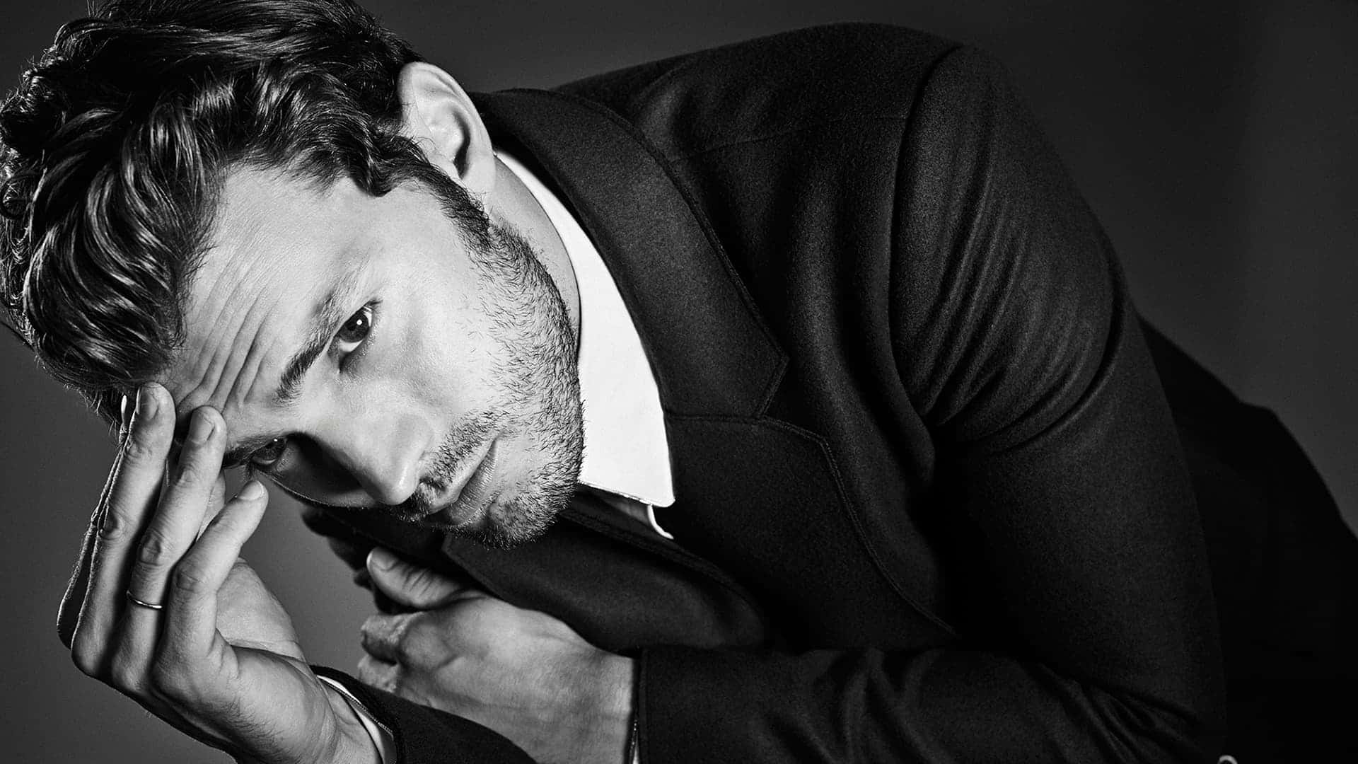 Actor Jamie Dornan In A Thoughtful Pose Wallpaper
