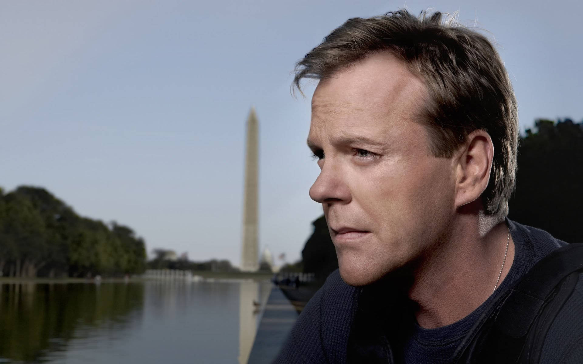 Kiefer Sutherland Portraying Jack Bauer in an Intense Scene Wallpaper
