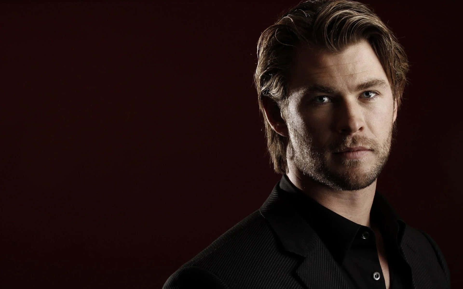 Chris Hemsworth In A Black Suit