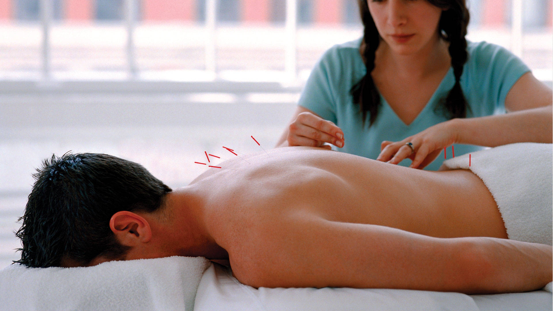 Acupuncturist Back Needle Insertion Wallpaper
