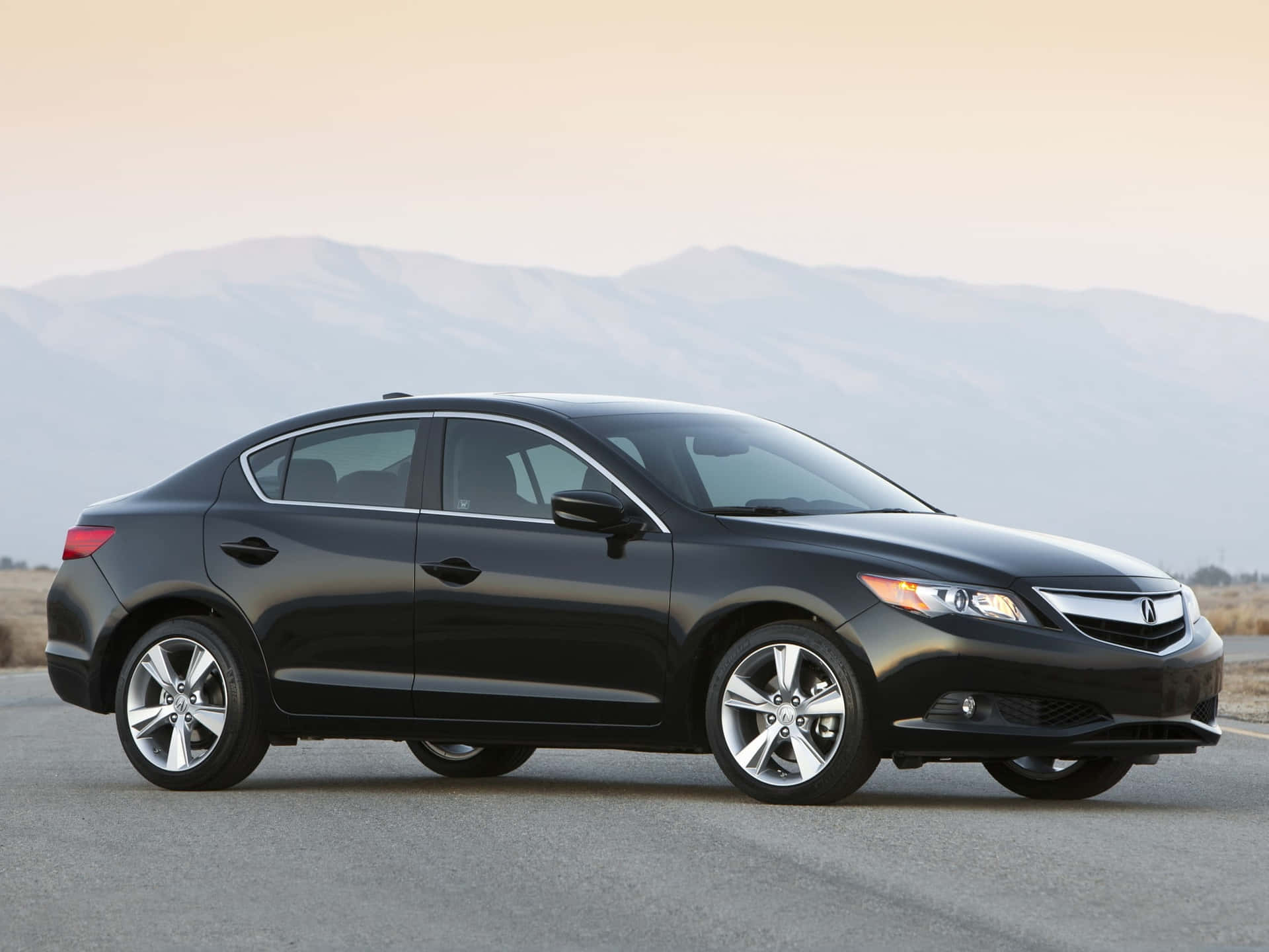 Sleek and Stylish Acura ILX on the Road Wallpaper