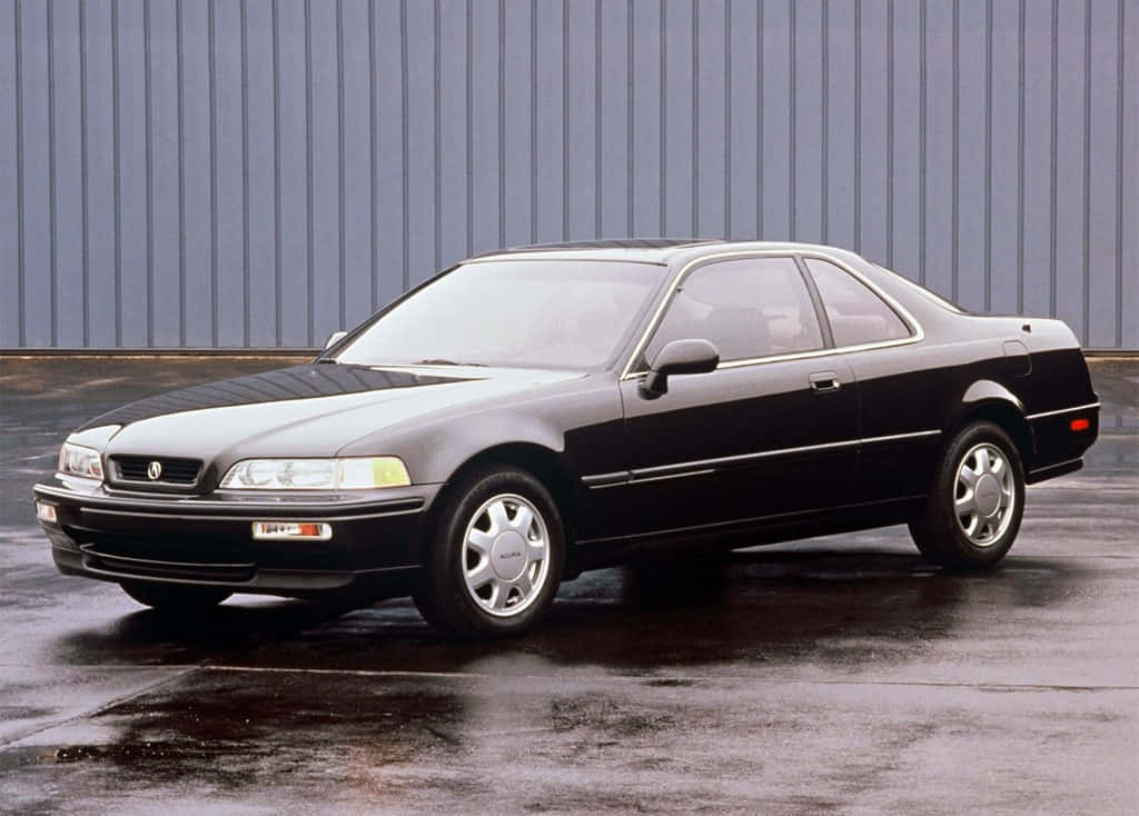 1991 Acura Legend in Vibrant Red Wallpaper