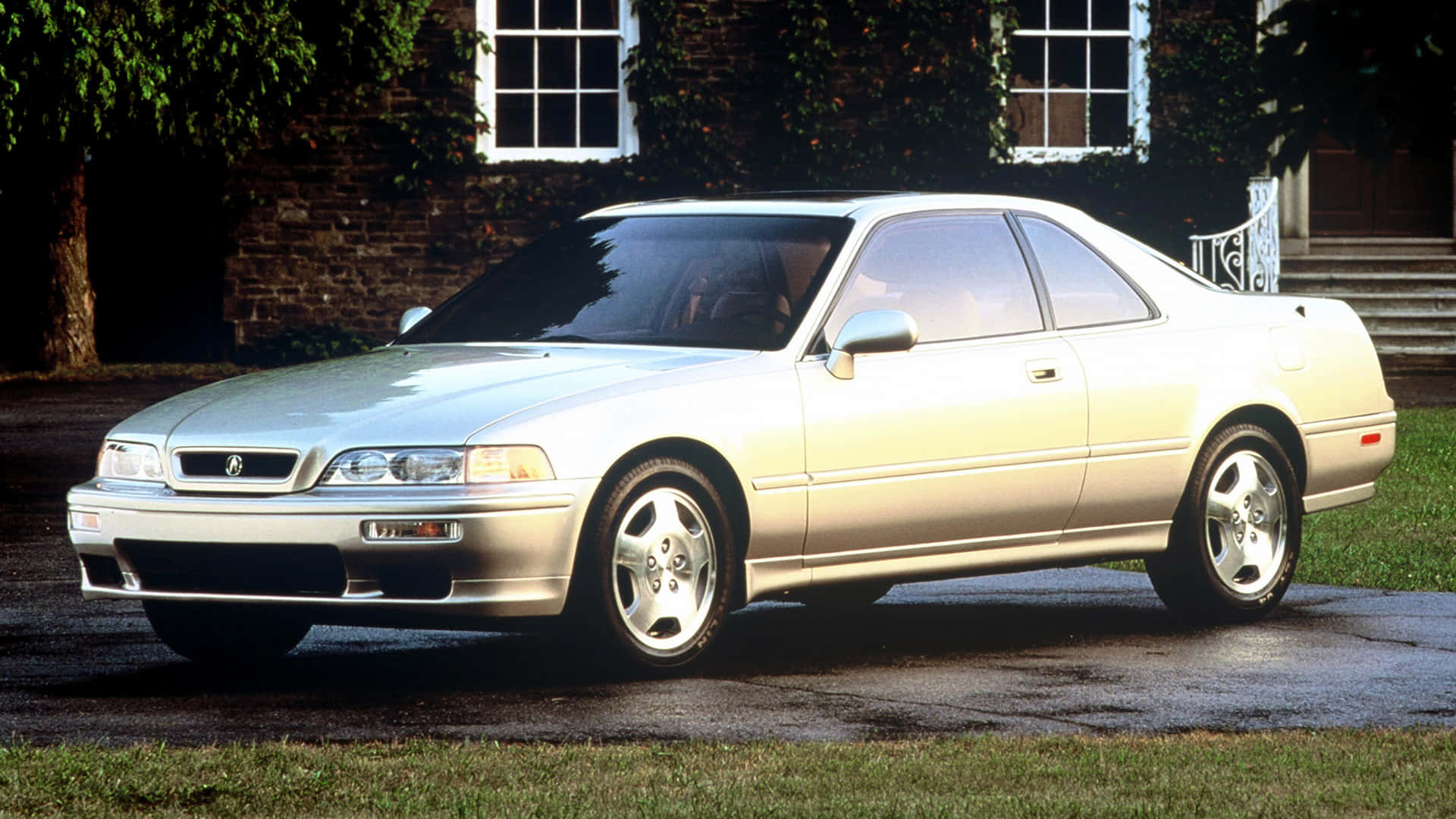 Impresionanteacura Legend En Una Hermosa Carretera Escénica Fondo de pantalla