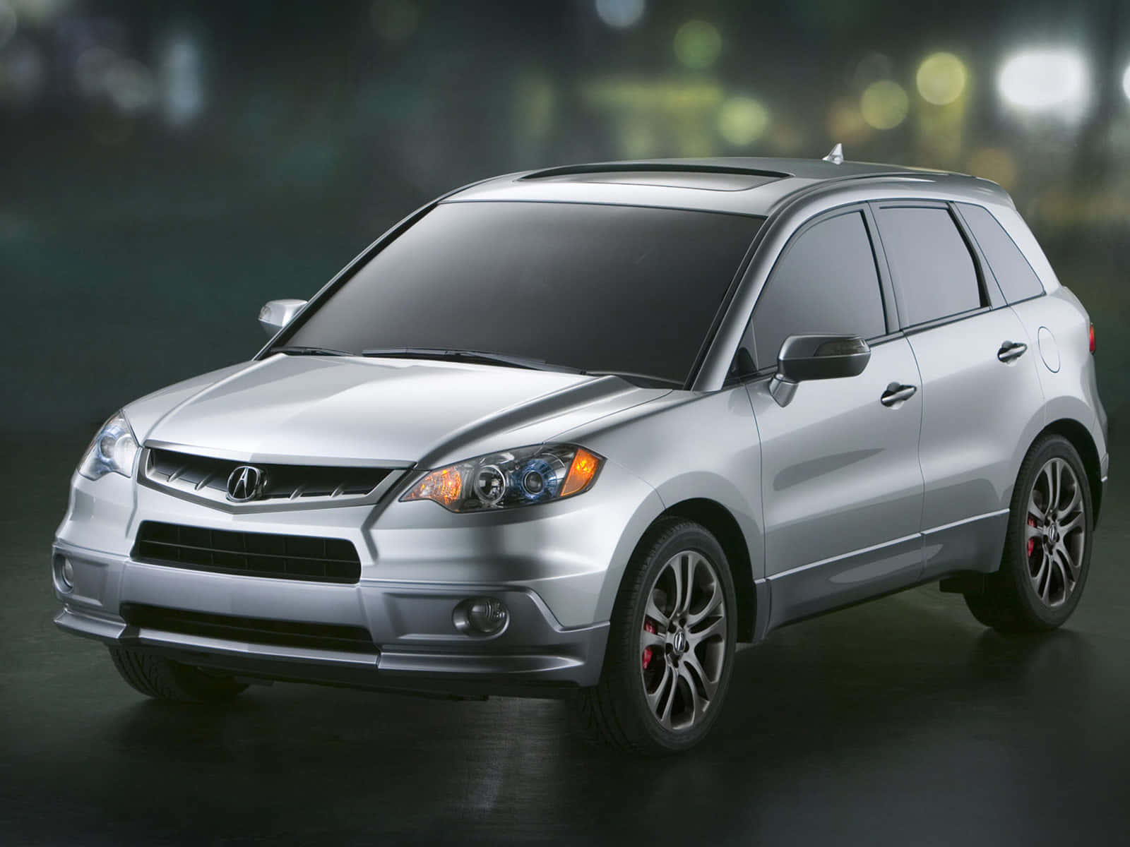 Der2012 Acura Cvt Wird In Einem Dunklen Raum Gezeigt.