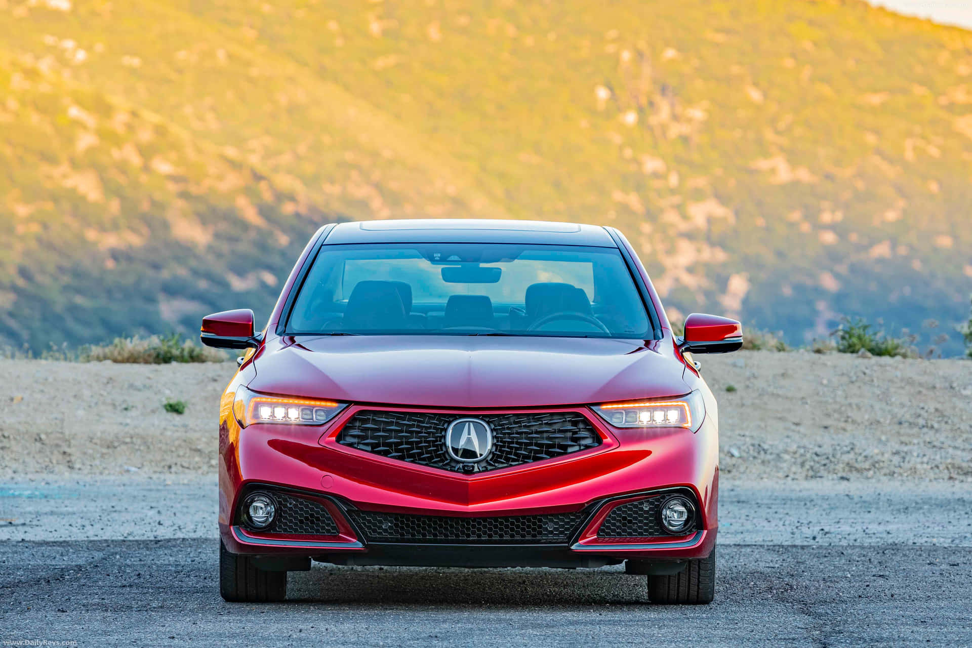 The Red 2019 Acura Rdx Is Parked On A Dirt Road