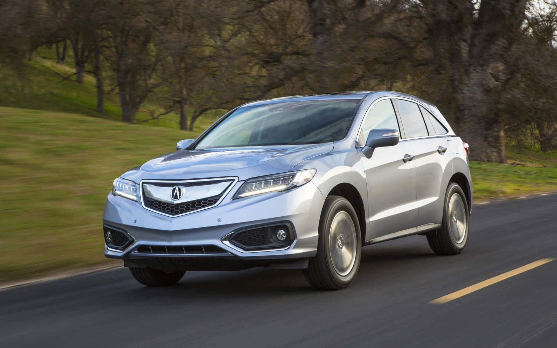 Stunning Acura RDX on a scenic mountain road Wallpaper