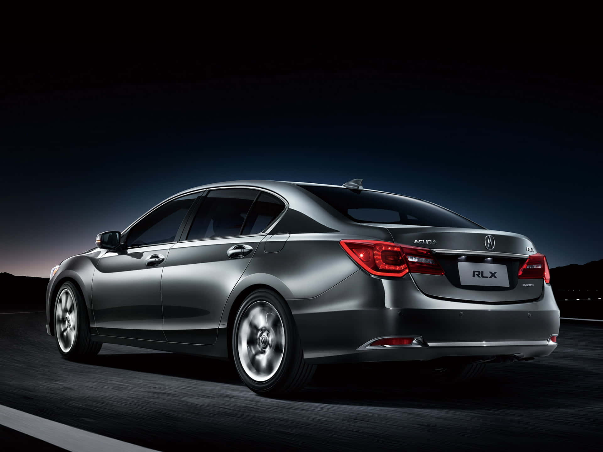 Acura RLX: A Sophisticated Sedan in Motion Wallpaper