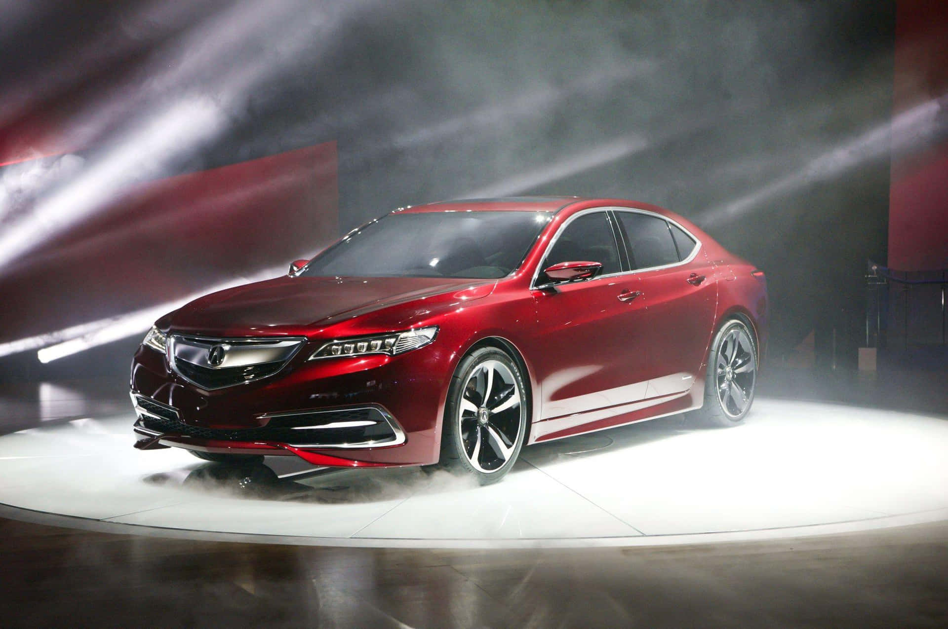 Stunning Acura TLX cruising down the road Wallpaper