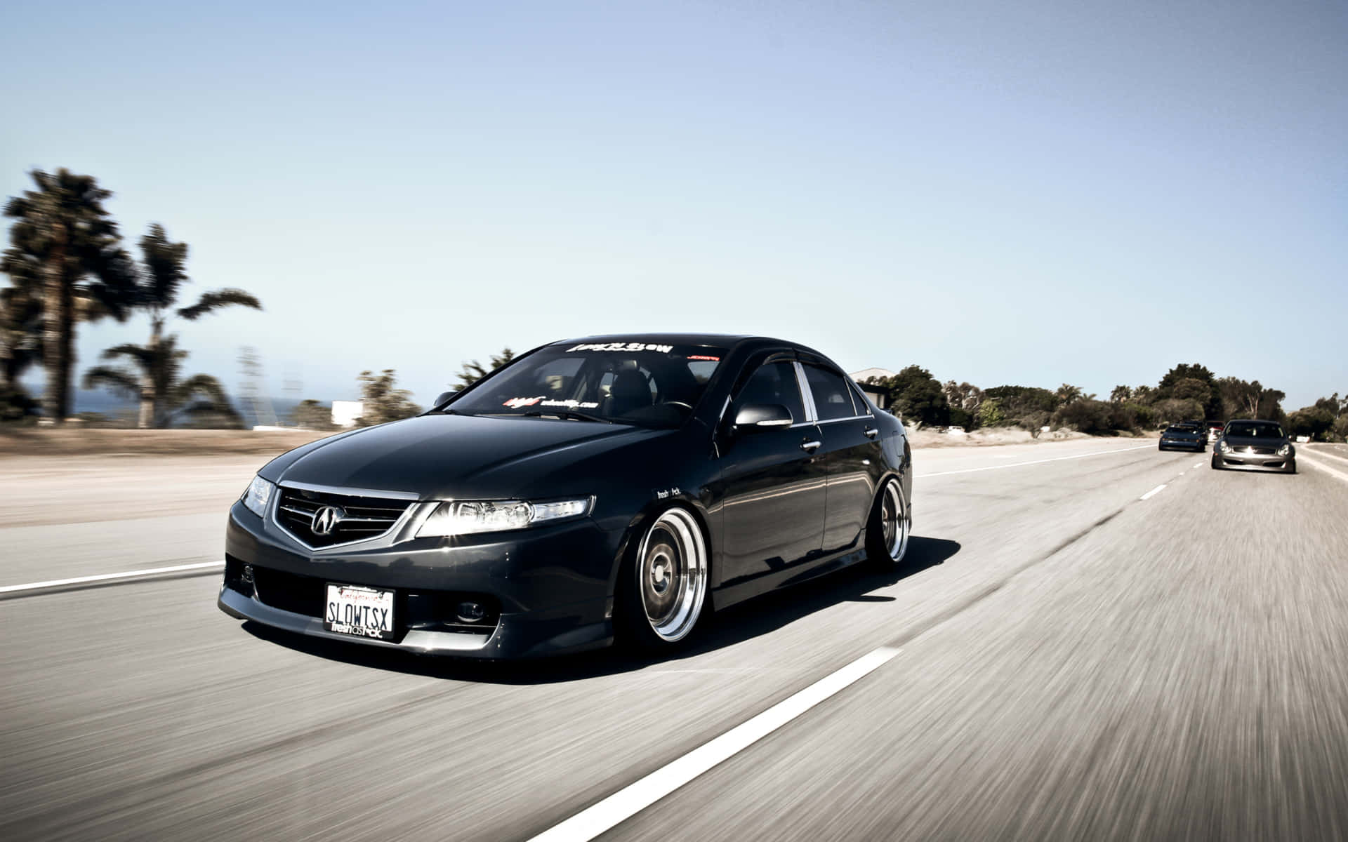 Sleek and Sophisticated Acura TSX on the Road Wallpaper