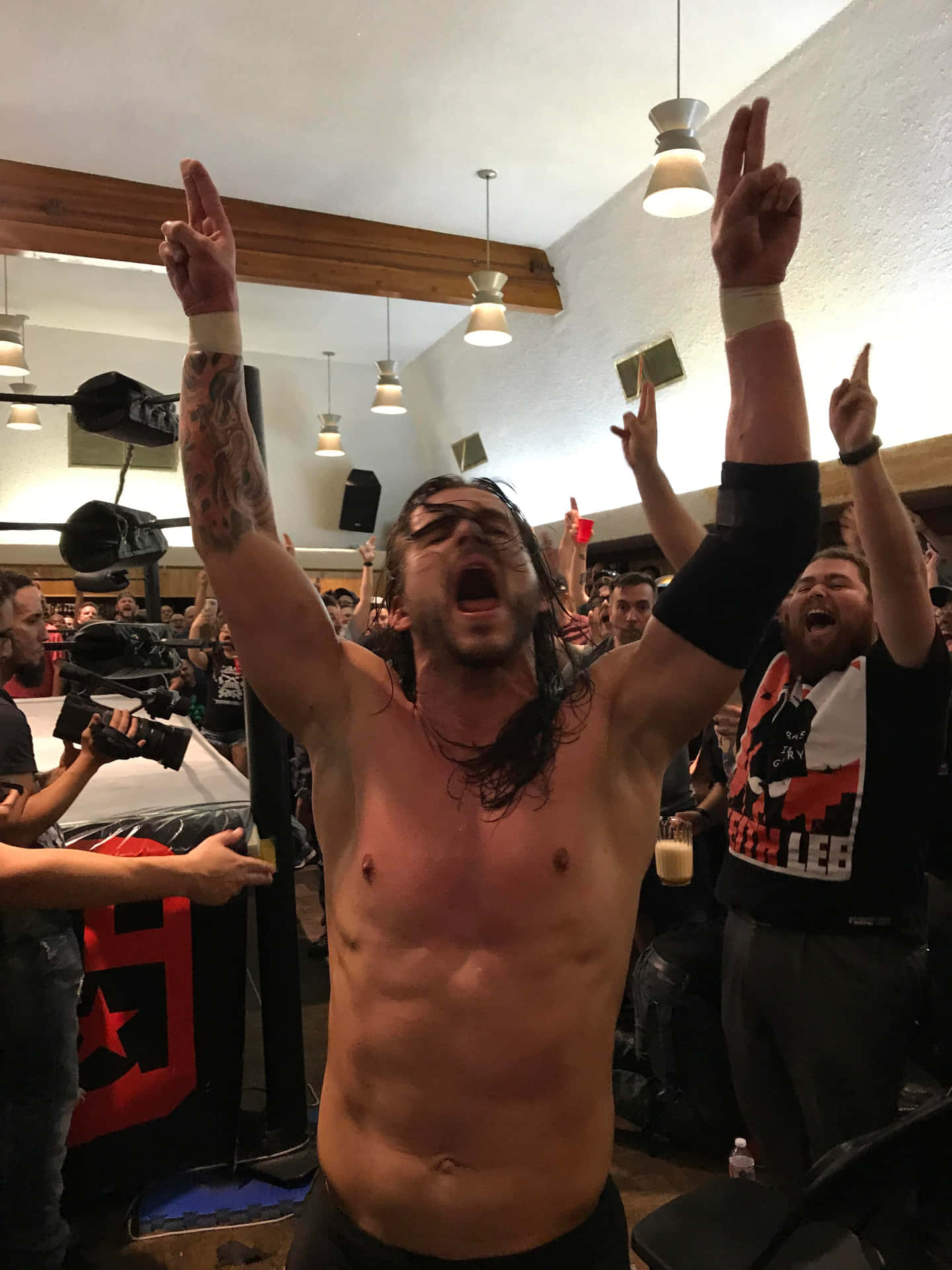Adam Cole Celebrating With The Crowd Wallpaper