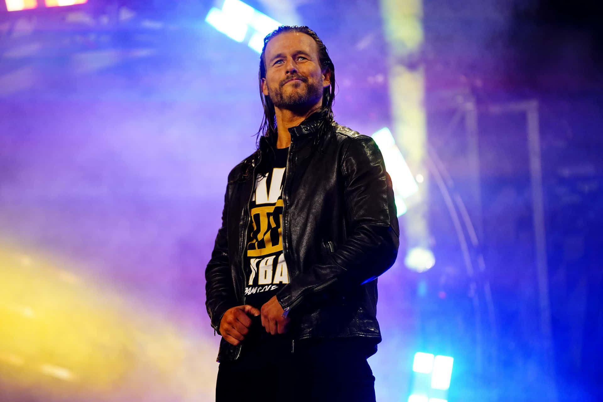 Adam Cole Posing And Smirking On Stage Wallpaper
