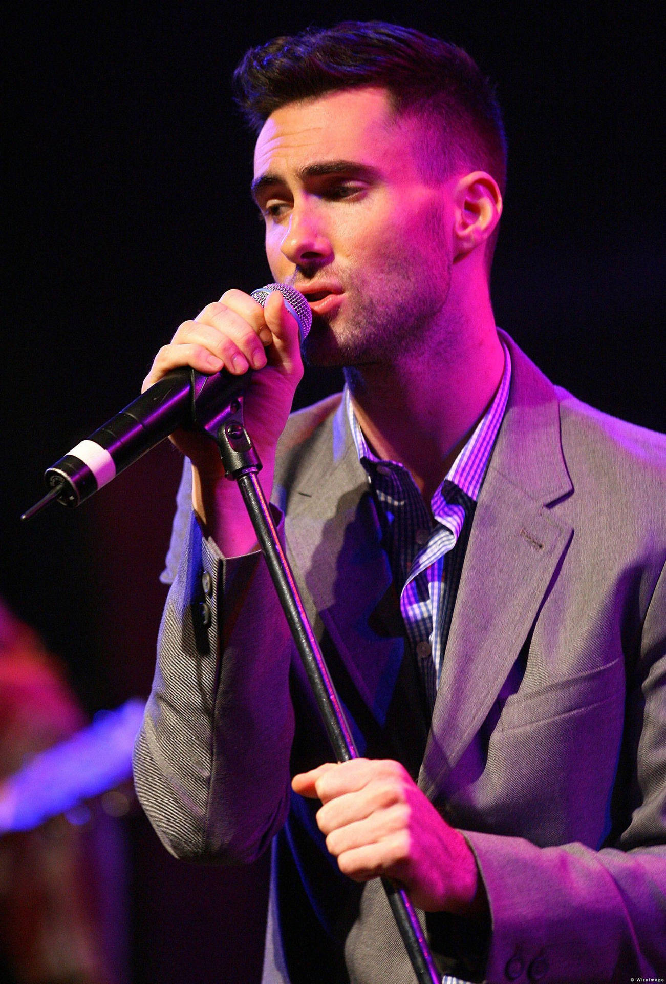 Adam Levine In Grey Suit Background
