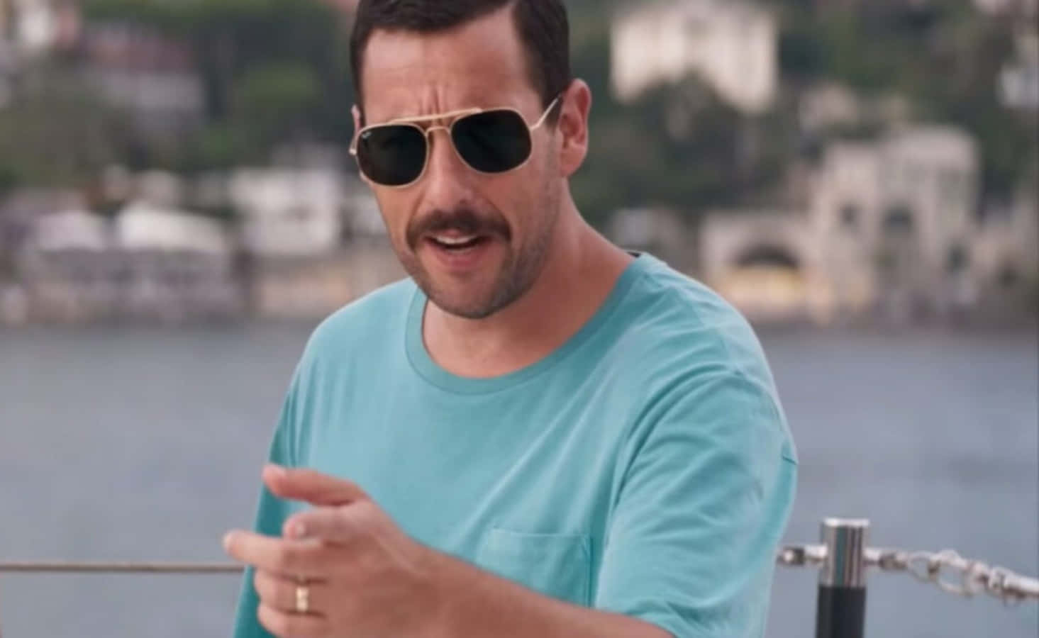 Actor Adam Sandler beams while filming his latest movie
