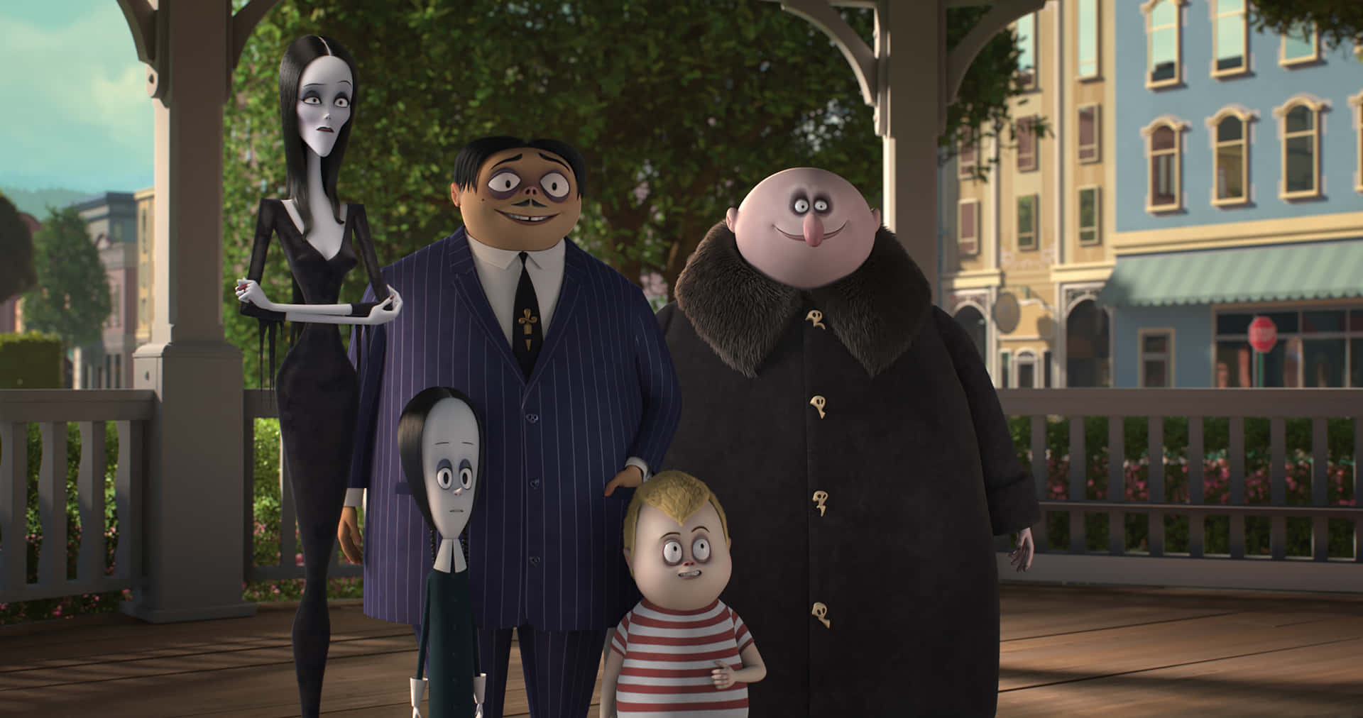 The Addams Family Is Standing On A Porch