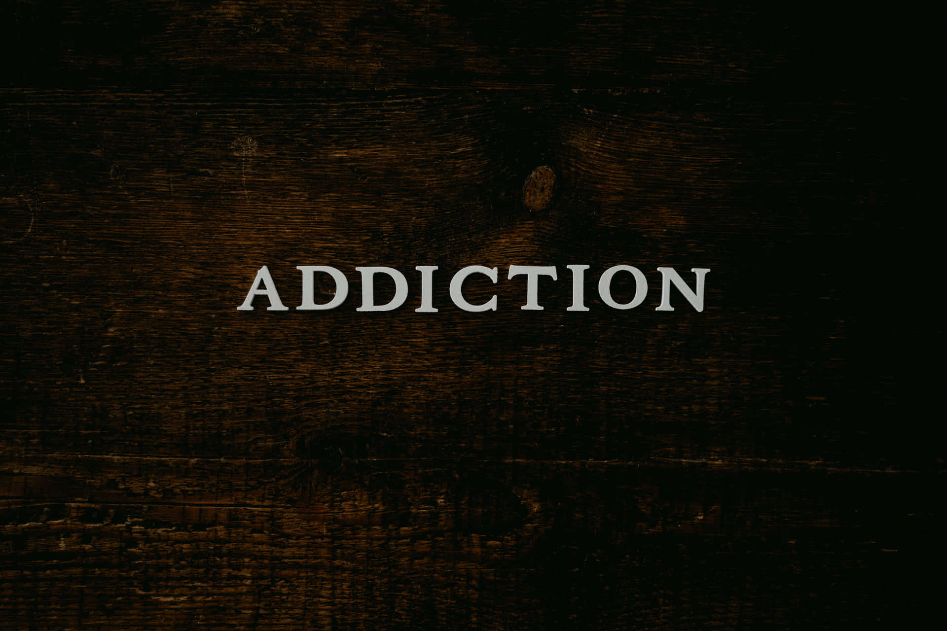 Addiction Text In Wood Background Wallpaper