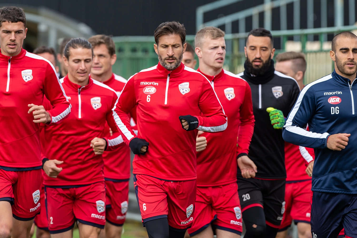 Adelaide United Voetbalteam In Actie Achtergrond