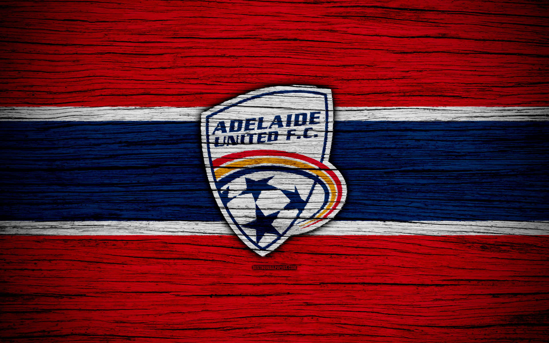 Adelaide United Soccer Team in Action Wallpaper