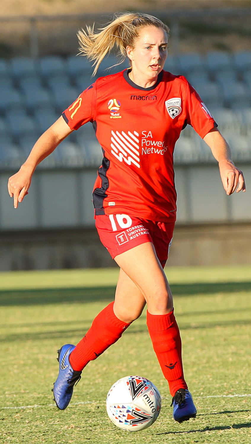 Adelaide United Team In Actie Tijdens Een Wedstrijd. Achtergrond