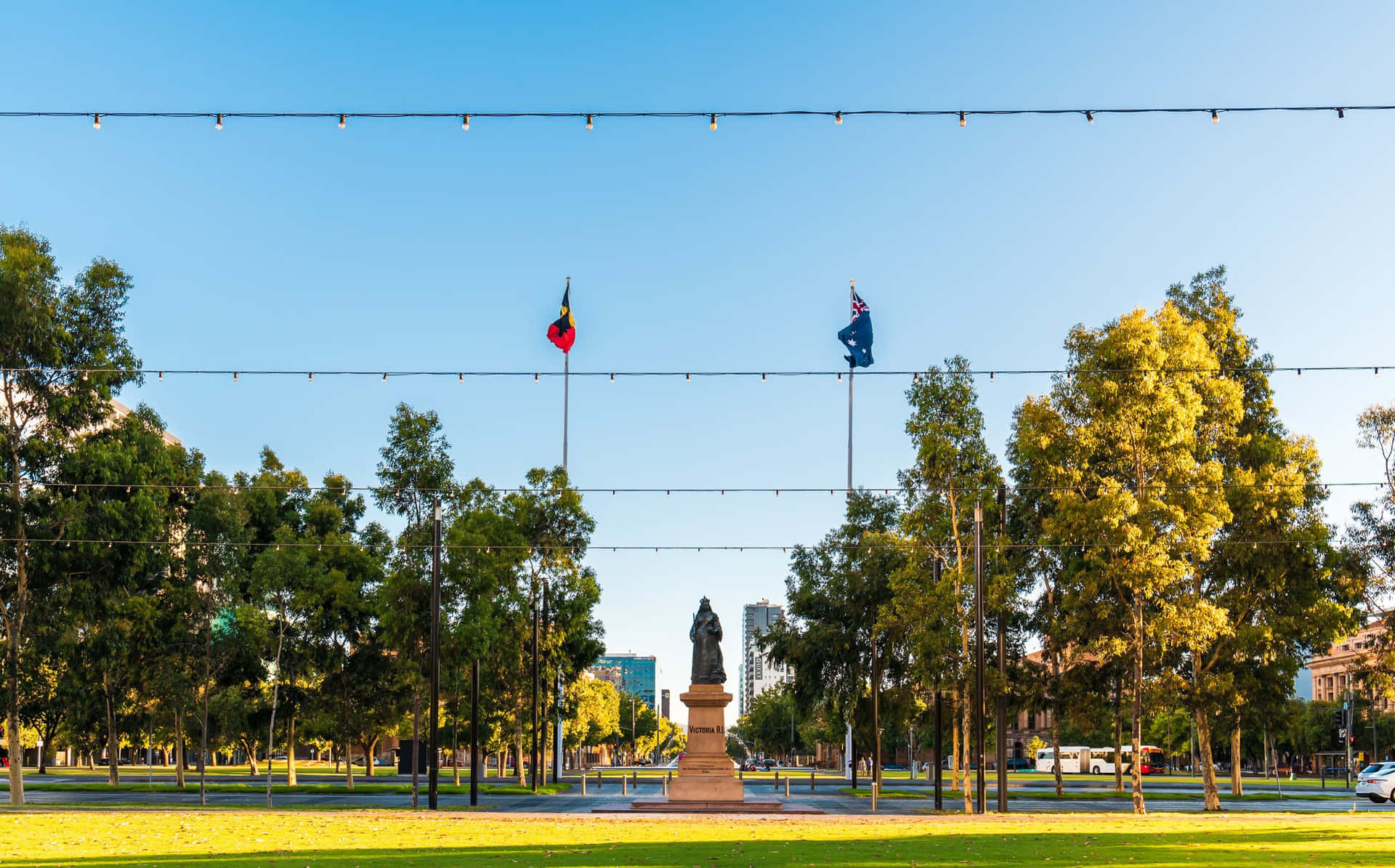 Adelaide Victoria Square Statueand Flags Wallpaper