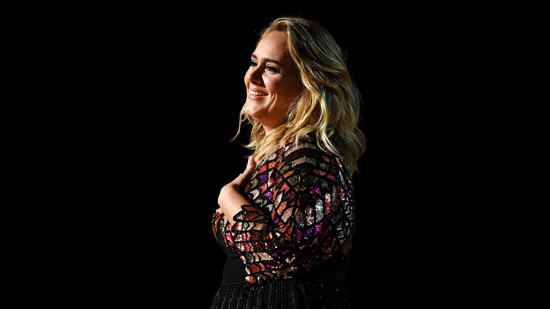 Adele enjoying the spotlight.