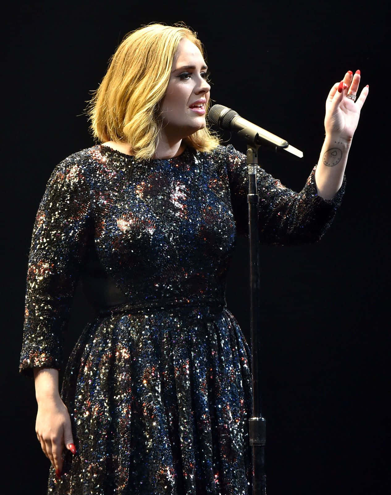 Adele is an English singer-songwriter and multi-Grammy Award winner