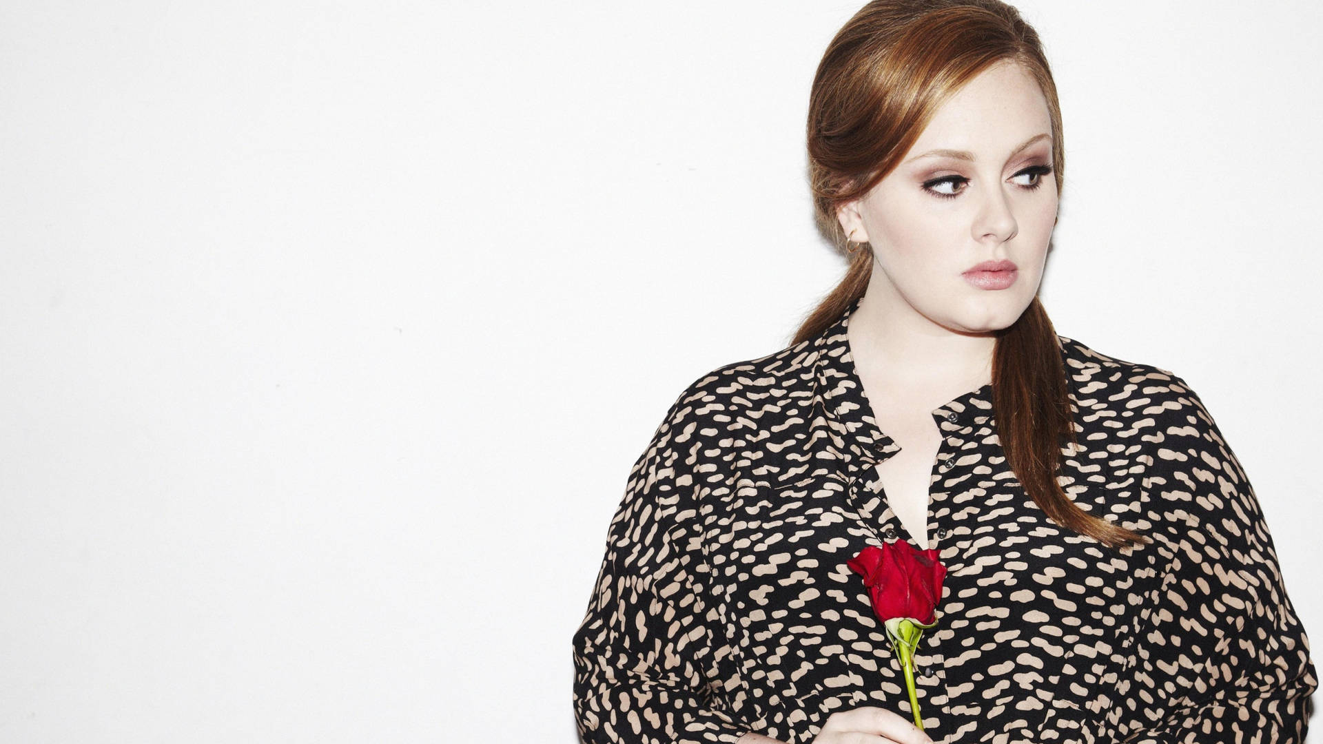 Adele Holding Rose Background