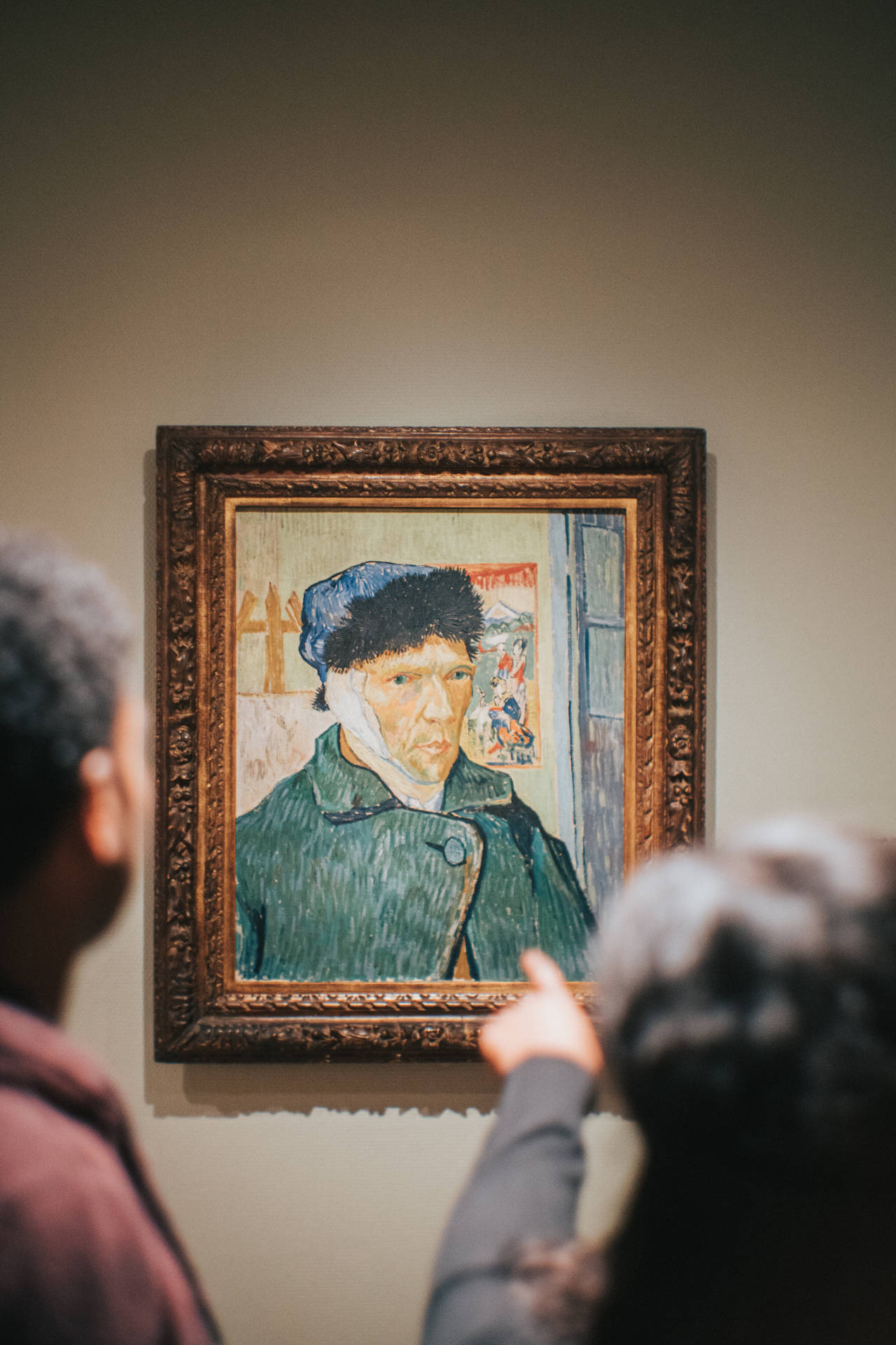 Admiring Paintings At Van Gogh Museum Wallpaper