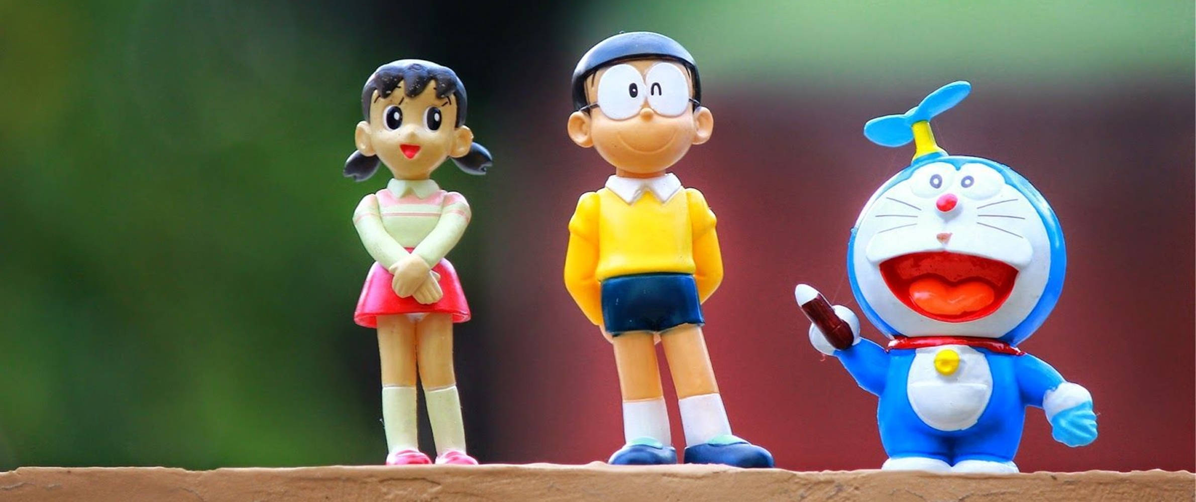 Adorable Action Figure Nobita Shizuka Background