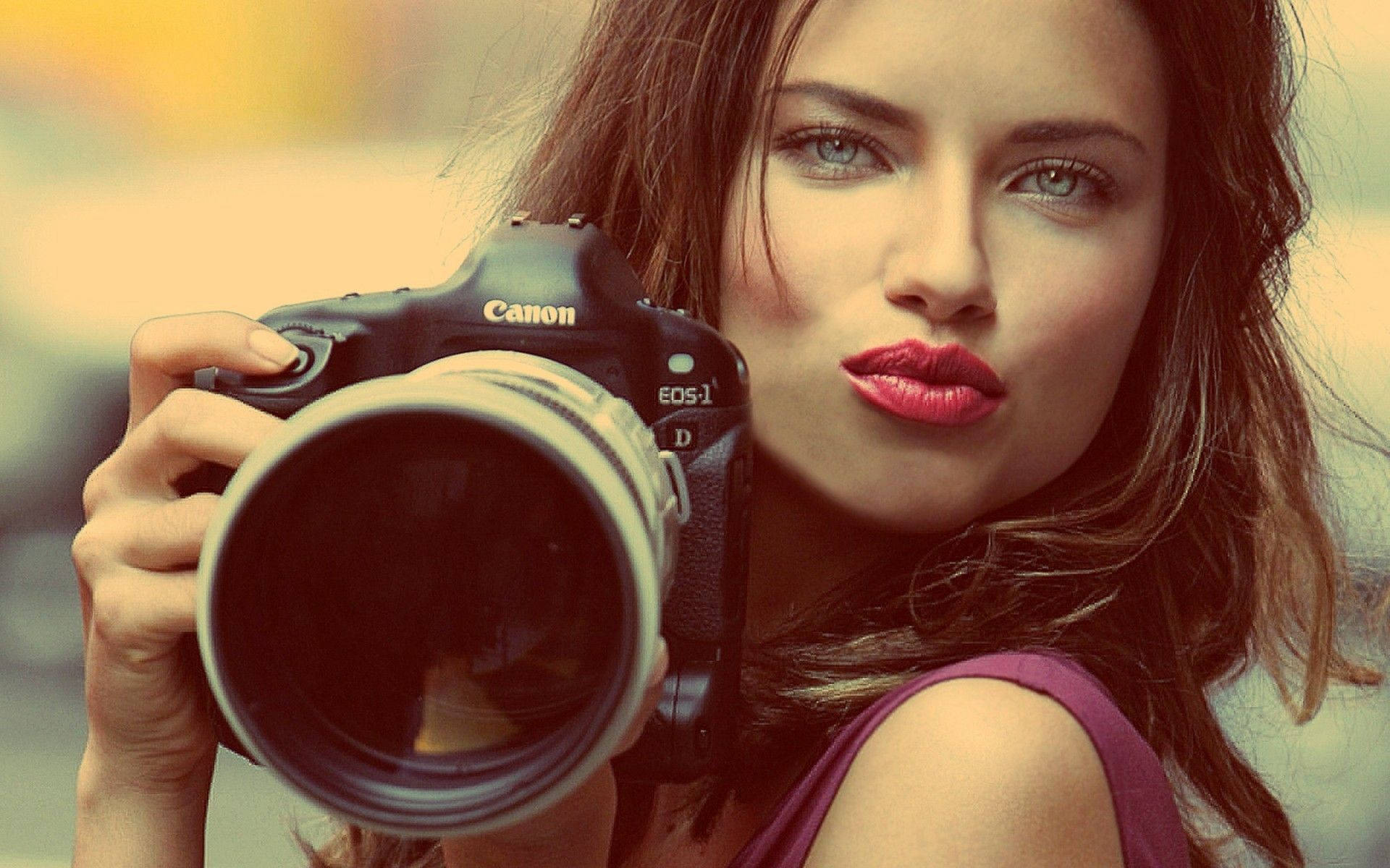 Adriana Lima With Camera Wallpaper