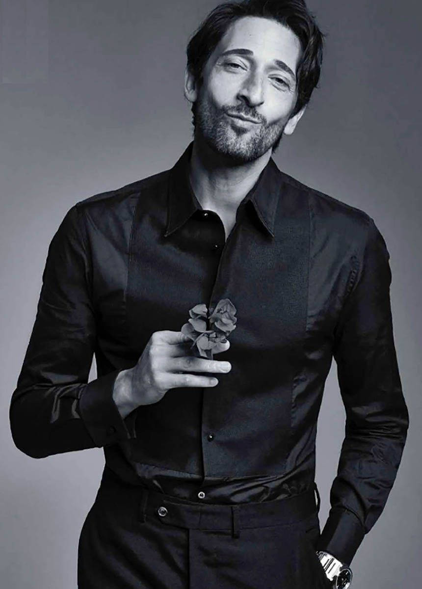 Adrien Brody Holding A Flower