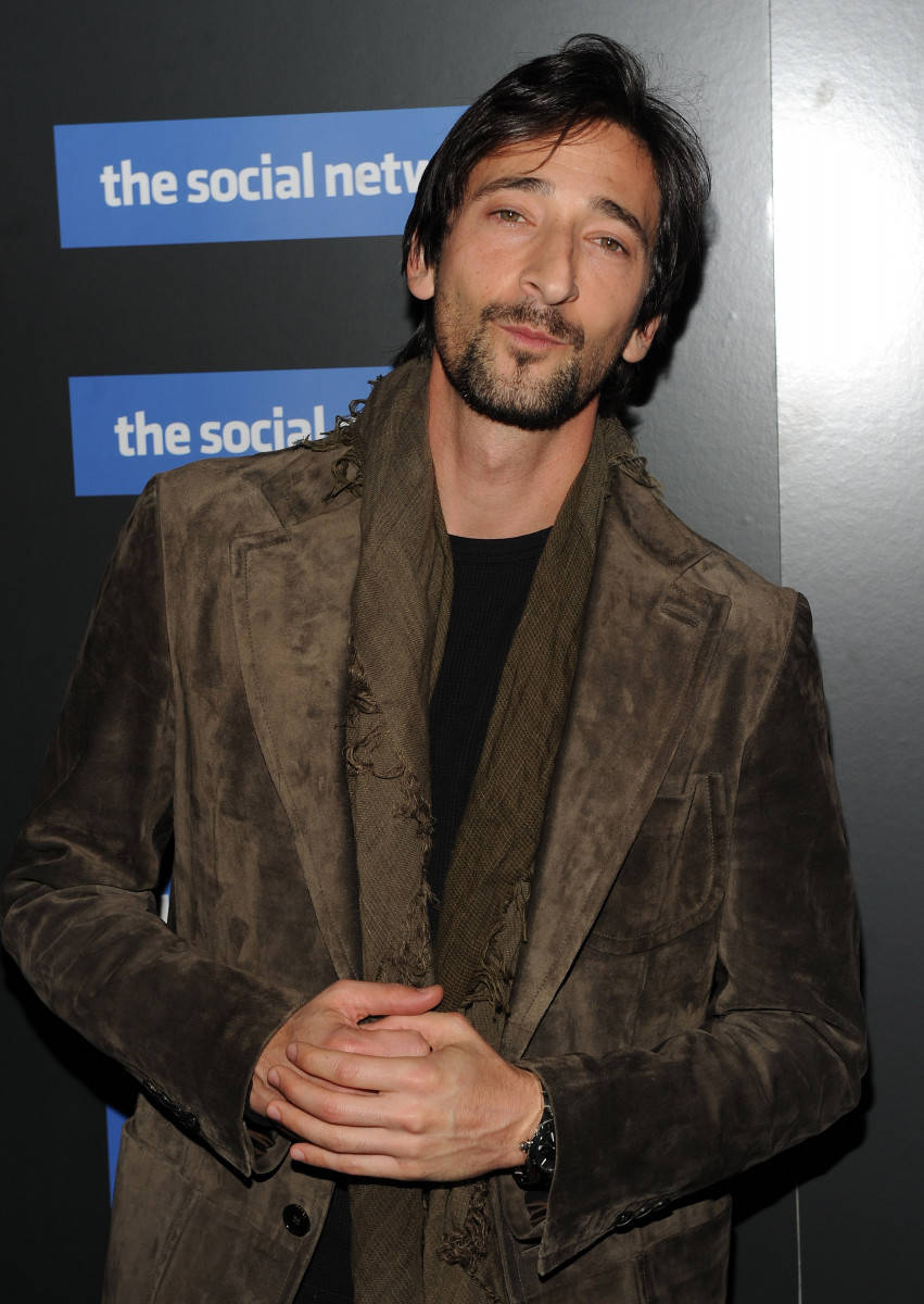 Adrien Brody Wearing A Brown Coat