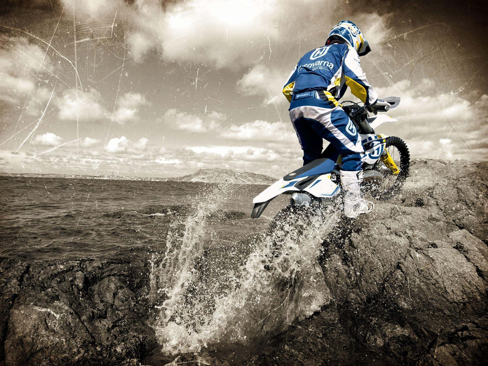 Adventure Unleashed - Husqvarna Motorbike In Action Wallpaper