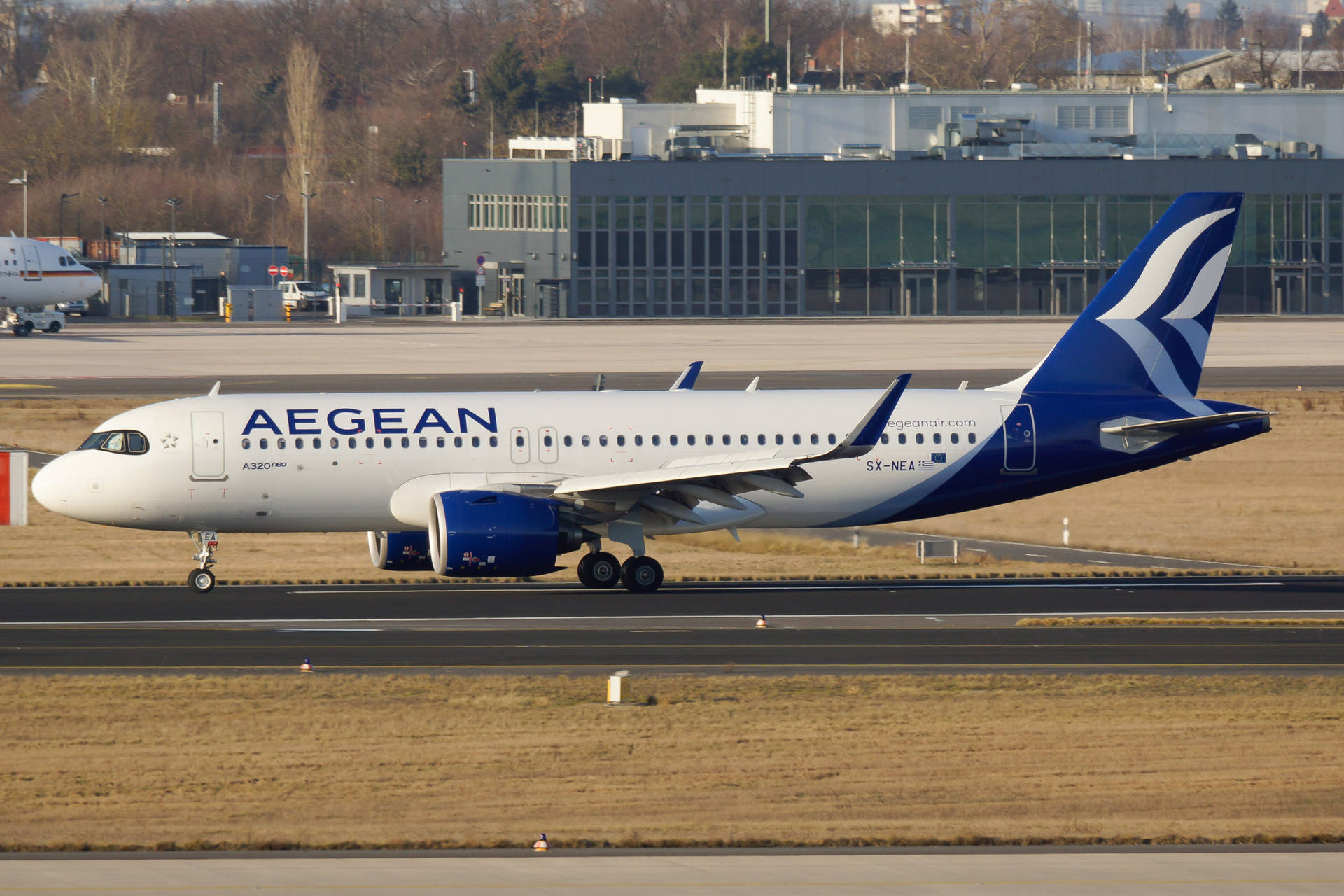 Aegean Airlines Airbus A320neo ready for takeoff on runway. Wallpaper