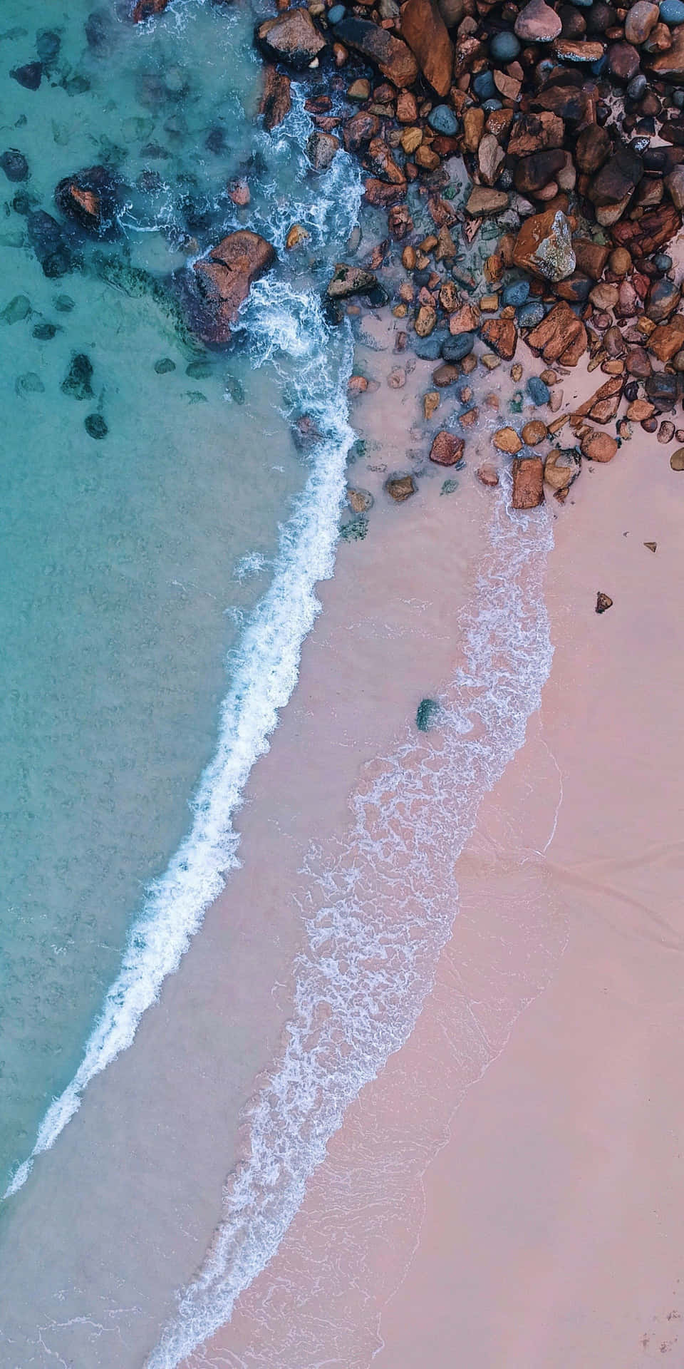 Aerial_ View_ Crystal_ Clear_ Waters_and_ Rocky_ Shoreline.jpg Wallpaper