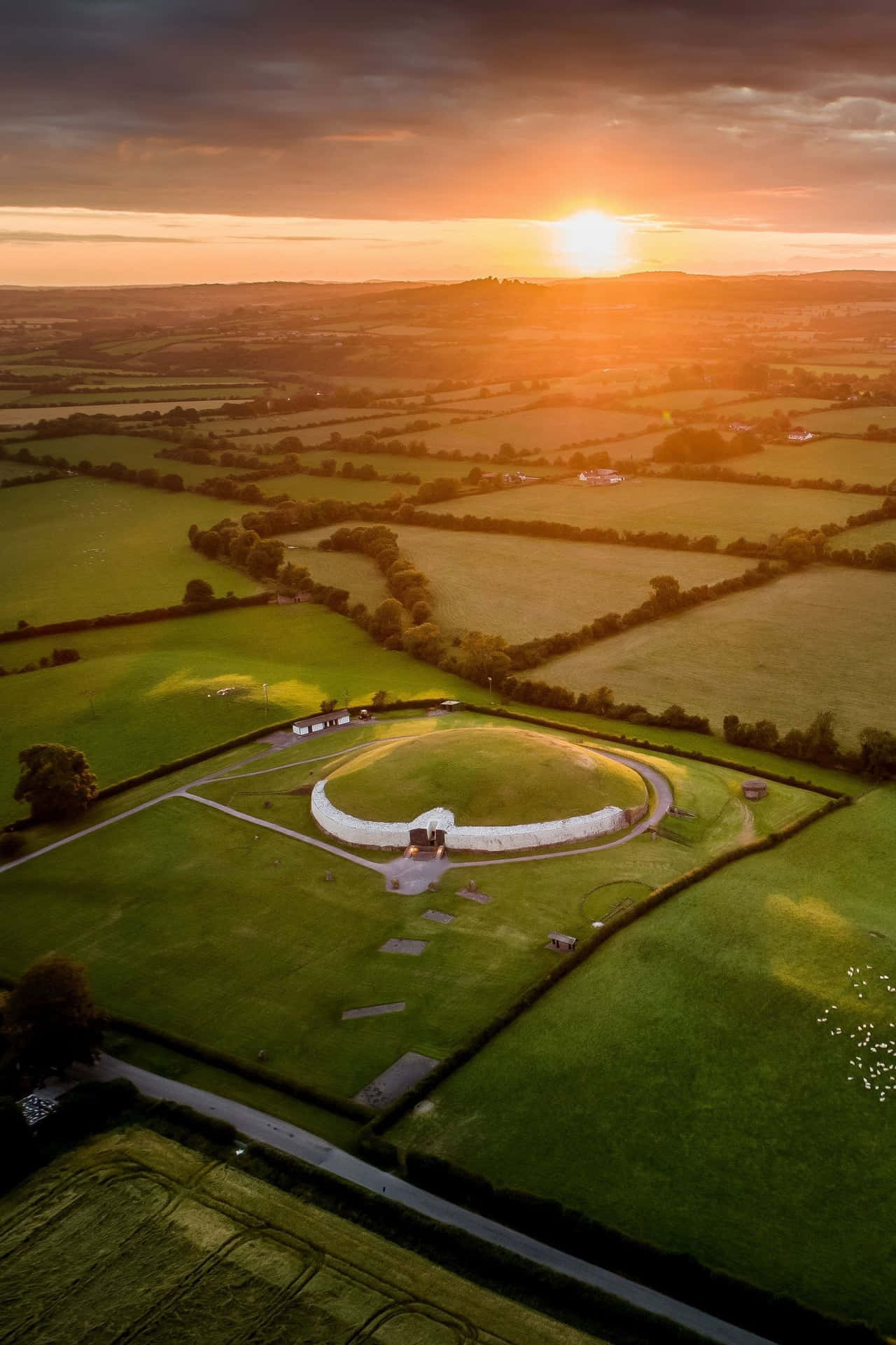 Aerial View Newgrange With Sunset Wallpaper