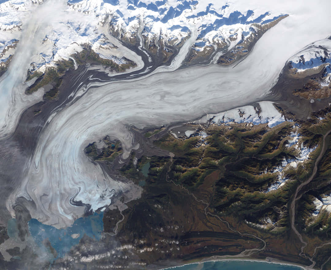 Aerial_ View_of_ Glacial_ Rivers_and_ Mountains.jpg Wallpaper