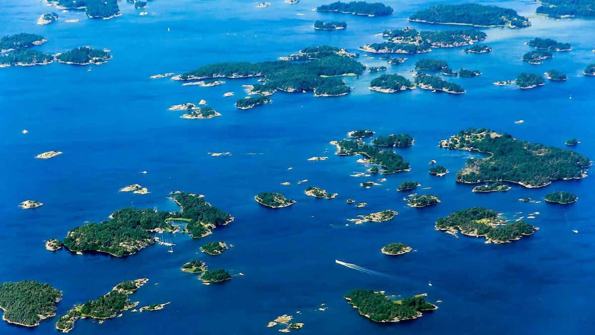 Aerial_ View_of_ Scattered_ Islands_ Archipelago Wallpaper
