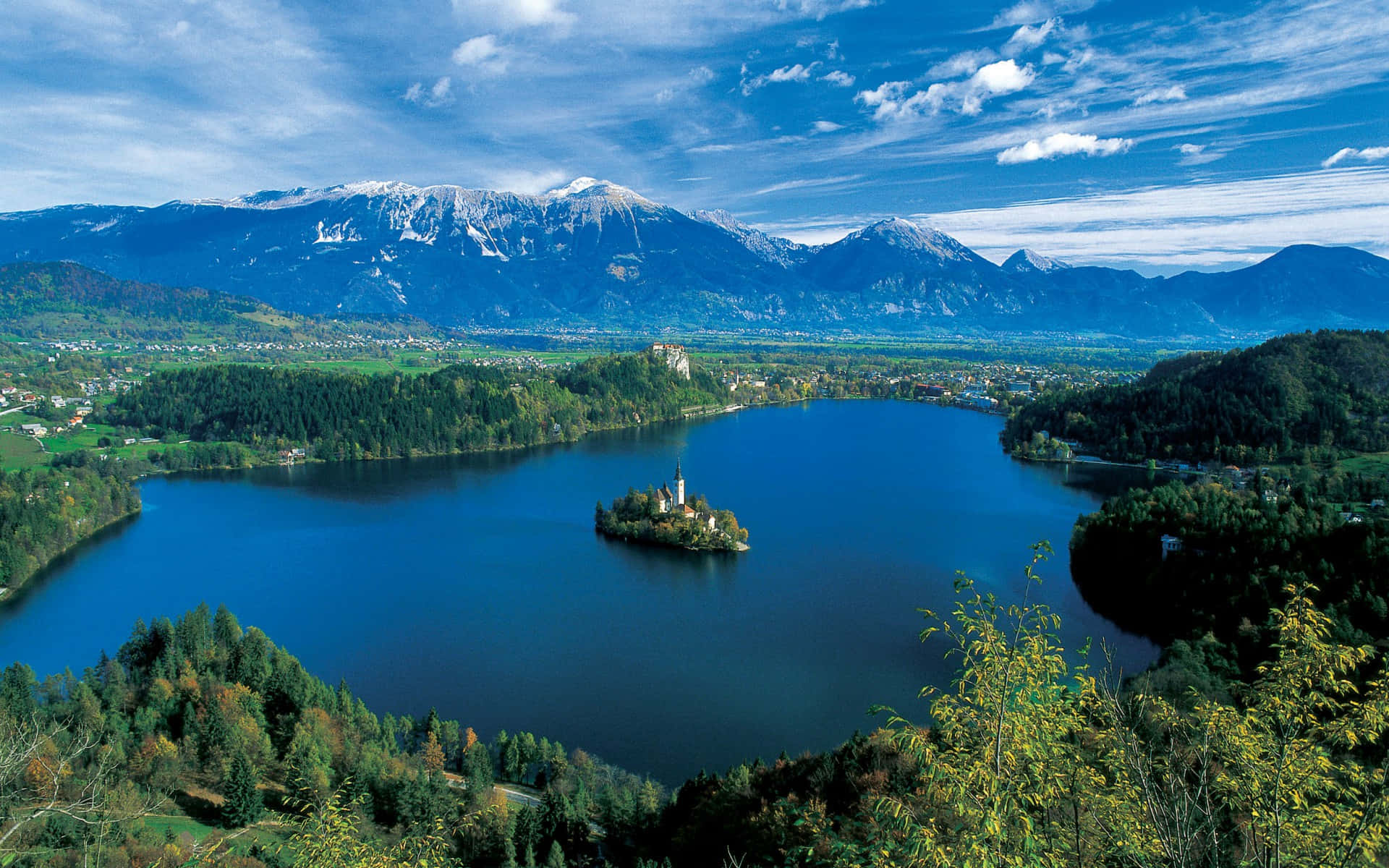 Aerial View Of The Bled Island In The Middle Of Lake Bled Wallpaper