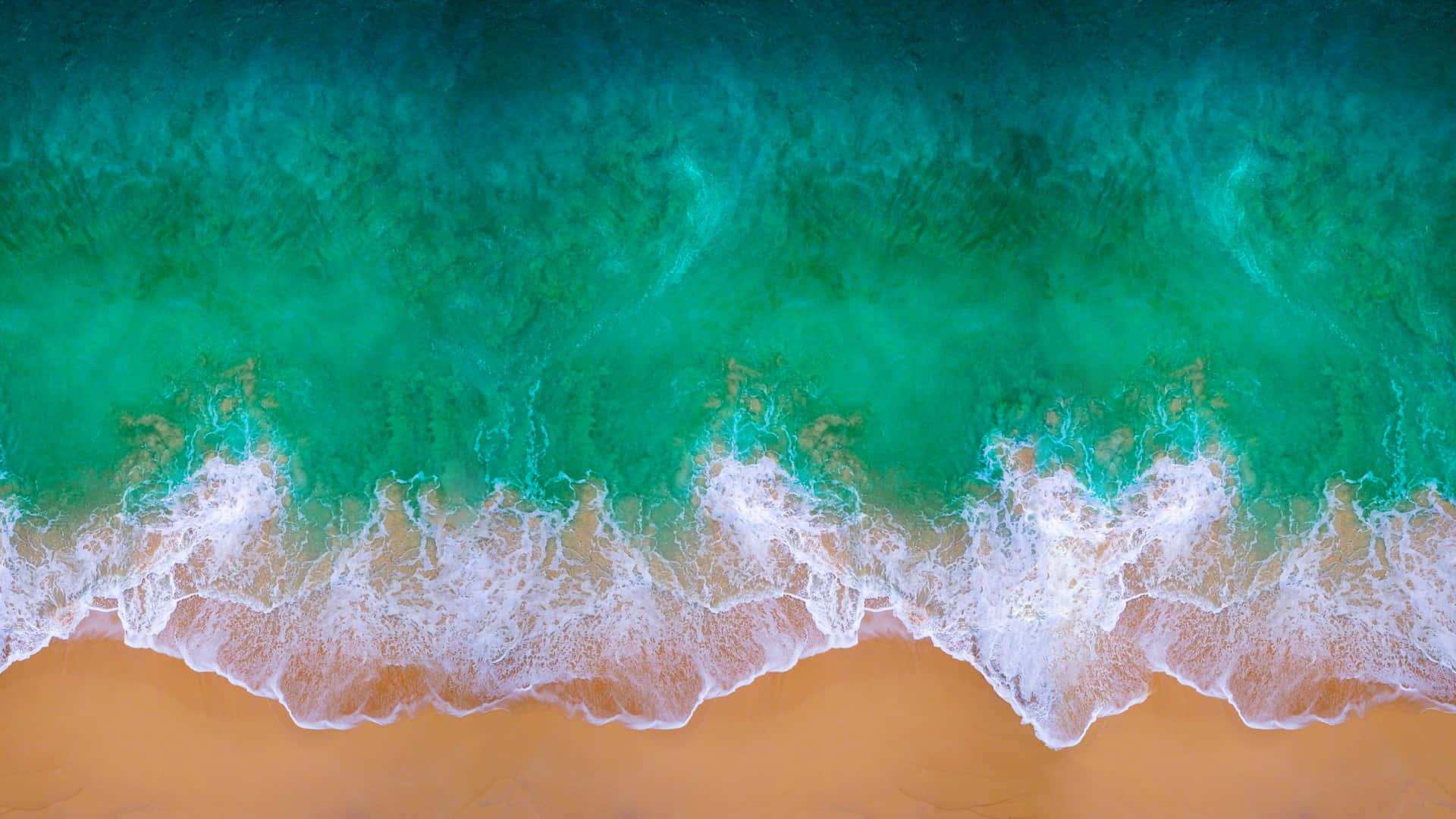 Aerial View Turquoise Waves Sandy Beach Wallpaper