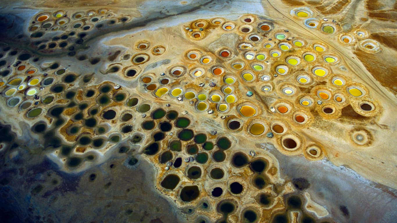 Aerial Viewof Colorful Geothermal Pools Wallpaper